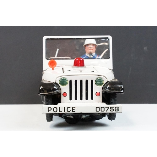 329 - Boxed TN Toys Japan Battery Operated Turn O Matic Gun Police Jeep, Jeep touch grubby otherwise gd, b... 