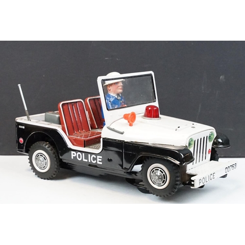 329 - Boxed TN Toys Japan Battery Operated Turn O Matic Gun Police Jeep, Jeep touch grubby otherwise gd, b... 