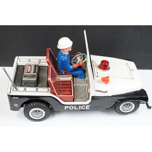 329 - Boxed TN Toys Japan Battery Operated Turn O Matic Gun Police Jeep, Jeep touch grubby otherwise gd, b... 