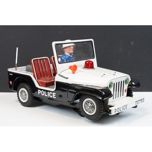 329 - Boxed TN Toys Japan Battery Operated Turn O Matic Gun Police Jeep, Jeep touch grubby otherwise gd, b... 