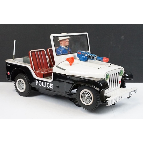 329 - Boxed TN Toys Japan Battery Operated Turn O Matic Gun Police Jeep, Jeep touch grubby otherwise gd, b... 