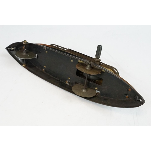 330 - Antique tin plate paddle wheel steam boat with handle and a metal painted motor boat, both showing w... 