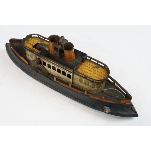 330 - Antique tin plate paddle wheel steam boat with handle and a metal painted motor boat, both showing w... 