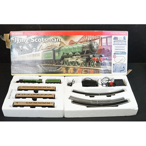 68A - Two boxed Hornby OO gauge electric train sets to include R1019 Flying Scotsman and R1155 Virgin Trai... 