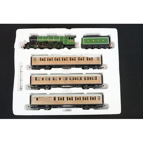 68A - Two boxed Hornby OO gauge electric train sets to include R1019 Flying Scotsman and R1155 Virgin Trai... 