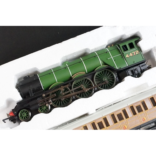 68A - Two boxed Hornby OO gauge electric train sets to include R1019 Flying Scotsman and R1155 Virgin Trai... 