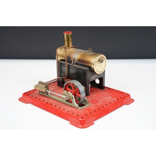 91 - Steam Engine - Mamod stationary steam engine with red base, cylindrical engine with turning wheel, m... 