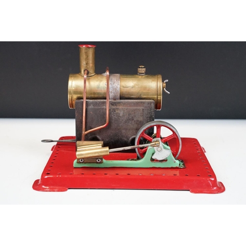 91A - Steam Engine - Mamod stationary steam engine with red base, cylindrical engine with turning wheel, m... 