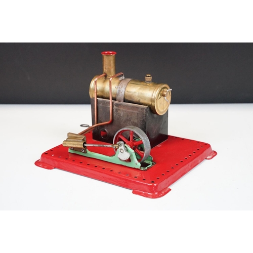 91A - Steam Engine - Mamod stationary steam engine with red base, cylindrical engine with turning wheel, m... 