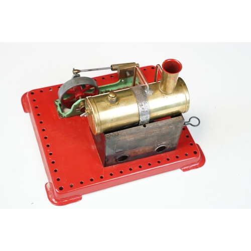 91A - Steam Engine - Mamod stationary steam engine with red base, cylindrical engine with turning wheel, m... 