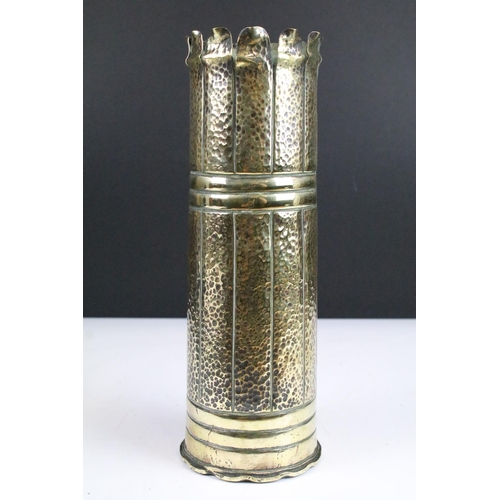 113A - Trench art shell brass vase with art nouveau figure engraving and design, 30cm high, 10cm diameter.