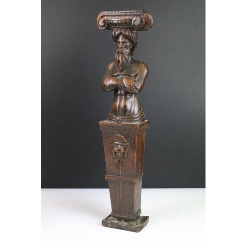 131 - Pair of carved wooden bearded men, flat top statue, wall hangings, 45cm tall.