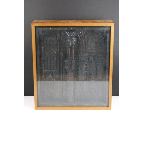 145 - Intricate gothic architectural wood carved panel in glass display case along with a 'Hold fast' mott... 