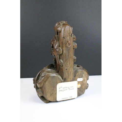 146 - 16th century carved oak poppyhead finial, 28cm long, 21cm wide, 10cm deep.