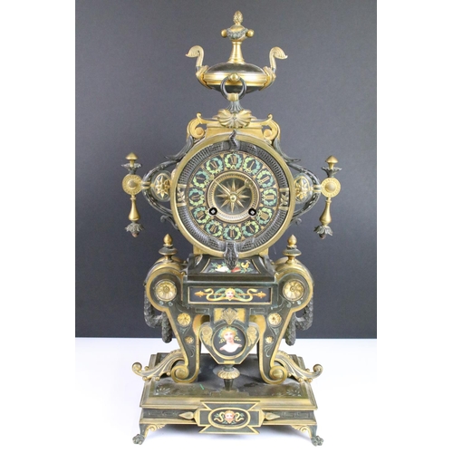 149 - 19th Century French Neo-Grec polychrome painted gilt and patinated bronze mantel clock, having a rou... 