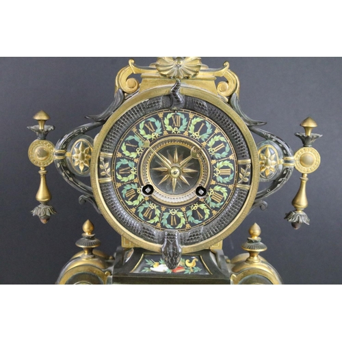 149 - 19th Century French Neo-Grec polychrome painted gilt and patinated bronze mantel clock, having a rou... 