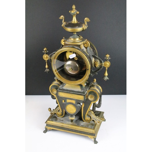 149 - 19th Century French Neo-Grec polychrome painted gilt and patinated bronze mantel clock, having a rou... 