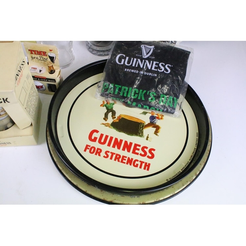 157 - Mixed Guinness promotional advertising items to include toucan salt and pepper pots, bottle clock, p... 