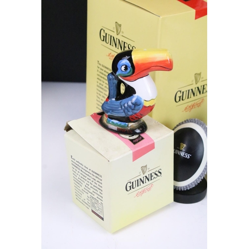 157 - Mixed Guinness promotional advertising items to include toucan salt and pepper pots, bottle clock, p... 