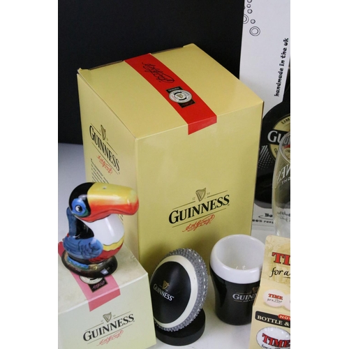 157 - Mixed Guinness promotional advertising items to include toucan salt and pepper pots, bottle clock, p... 