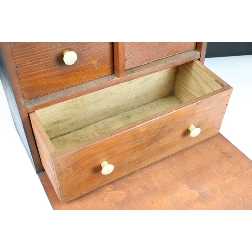 158 - Wooden set of portable drawers in lockable cabinet case with handle, includes key.