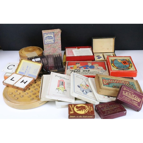 308 - A collection of vintage games to include chess and solitaire together with a selection of card games... 