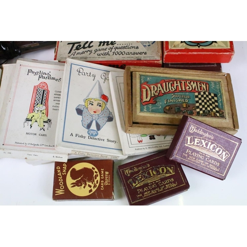 308 - A collection of vintage games to include chess and solitaire together with a selection of card games... 