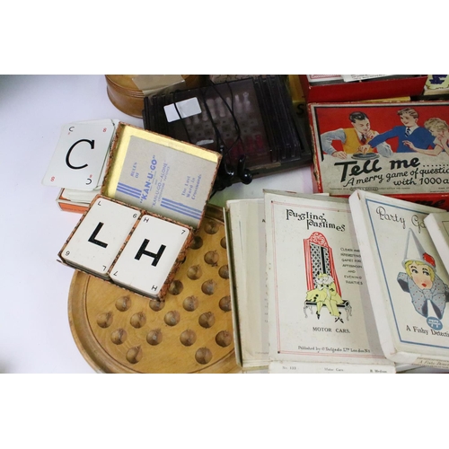 308 - A collection of vintage games to include chess and solitaire together with a selection of card games... 