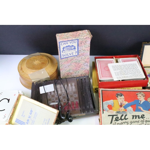 308 - A collection of vintage games to include chess and solitaire together with a selection of card games... 