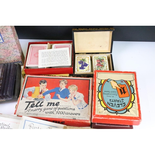 308 - A collection of vintage games to include chess and solitaire together with a selection of card games... 