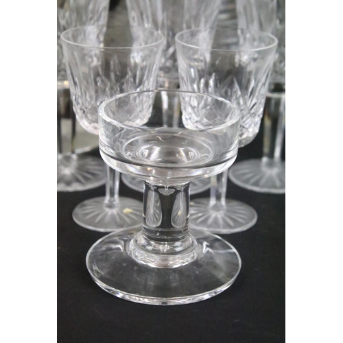 54 - Cut crystal glass square cut spirit decanter with twelve wine glasses, seven sherry glasses and six ... 