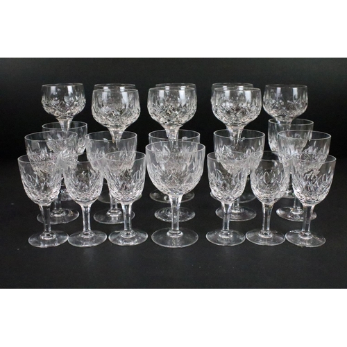 56 - Stuart crystal glasses, all etched on base, to include eight tall hock glasses, eight claret, six sh... 