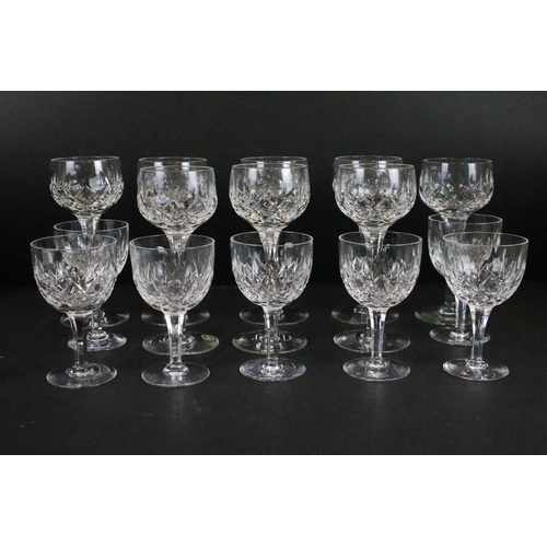 56 - Stuart crystal glasses, all etched on base, to include eight tall hock glasses, eight claret, six sh... 