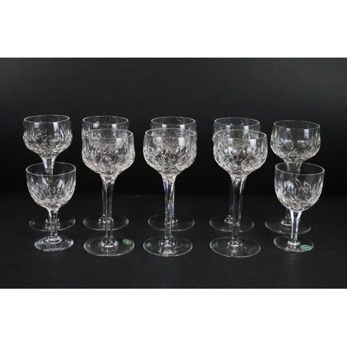 56 - Stuart crystal glasses, all etched on base, to include eight tall hock glasses, eight claret, six sh... 