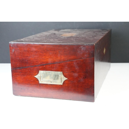 128 - Mahogany writing slope box with brass handles and inlay detailing, complete with two inkwells, two l... 