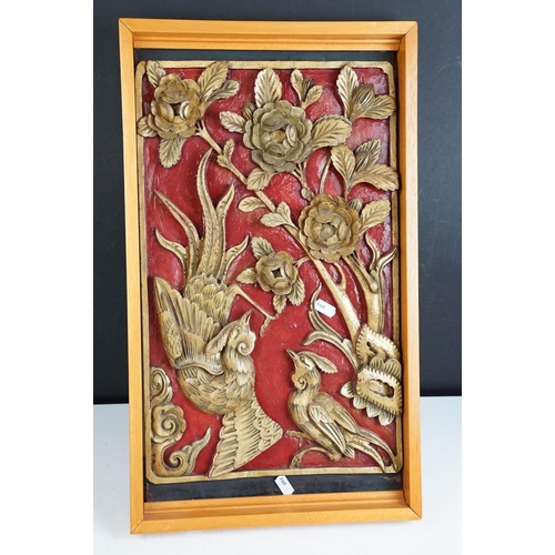 142 - 19th Century Chinese carved panels in red and gold depicting birds, flowers, storks and dragons in v... 