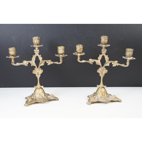 173 - Art Nouveau style brass candle sticks with other candle holders, tray and trinket trays.