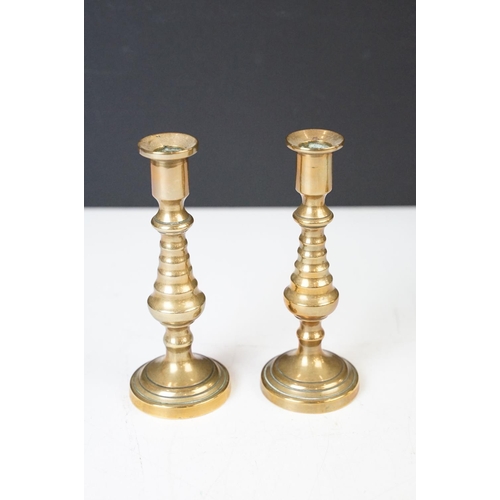 173 - Art Nouveau style brass candle sticks with other candle holders, tray and trinket trays.