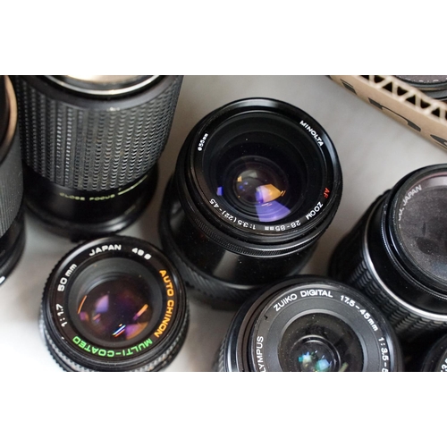 178 - Very large quantity of lenses of prime and zoom lenses featuring brands Canon, Olympus, Minolta and ... 