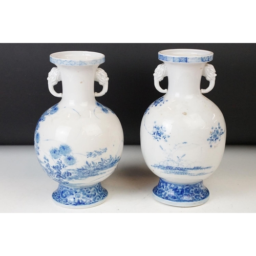 2 - Two 19th century Chinese blue and white twin handled vases with hand painted floral decoration and r... 