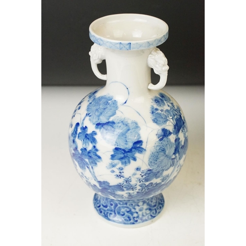 2 - Two 19th century Chinese blue and white twin handled vases with hand painted floral decoration and r... 