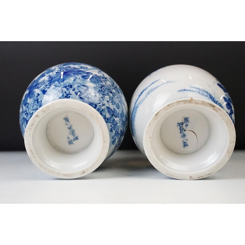 2 - Two 19th century Chinese blue and white twin handled vases with hand painted floral decoration and r... 