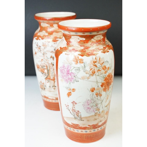 20 - Pair of large Japanese Kutani vases, red with white panels of flowers, signed with Japanese characte... 