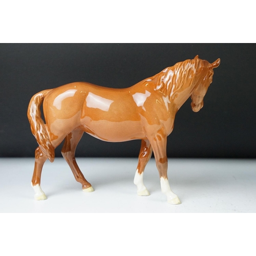 22 - Royal Doulton 'Appaloosa' stallion horse and Beswick chestnut horse ceramic gloss figurines. 20cm ta... 