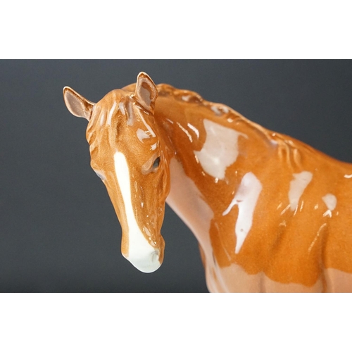 22 - Royal Doulton 'Appaloosa' stallion horse and Beswick chestnut horse ceramic gloss figurines. 20cm ta... 