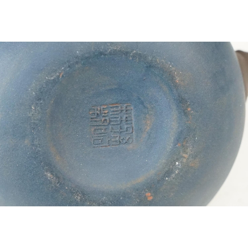 24 - Dark blue Chinese small handmade clay teapot kettle with inscriptions and branch design handle. Sign... 