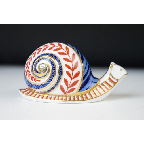 39 - Royal Crown Derby Imari pattern snail paperweight with gold stamped base stopper along with large Mu... 