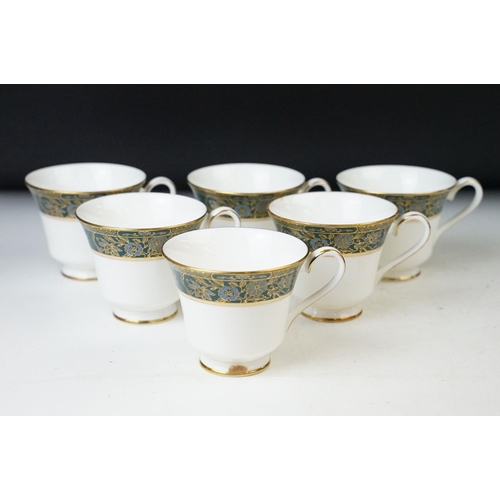 47 - Royal Doulton 'Carlyle' green and gold dinner set with six cups and saucers, milk jug, sugar bowl, f... 