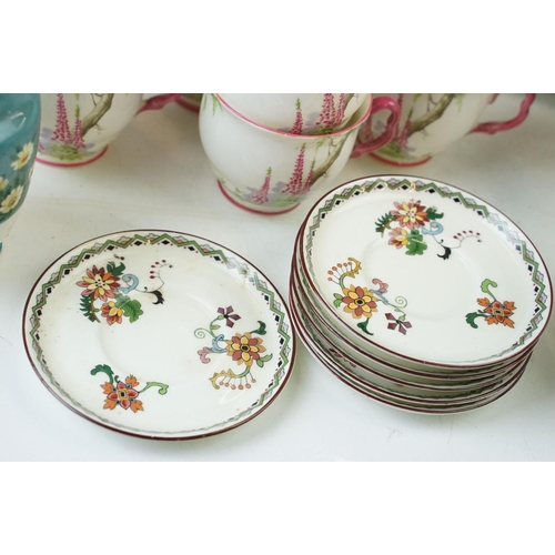 49 - Royal Albert 'Foxglove' pink handled eight cups and saucers, eight side plates, milk jug and cake pl... 