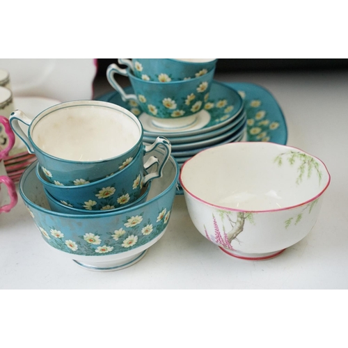 49 - Royal Albert 'Foxglove' pink handled eight cups and saucers, eight side plates, milk jug and cake pl... 